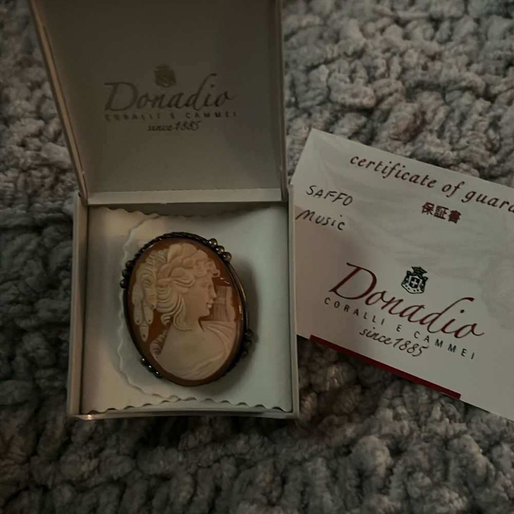 A vintage Donadio pendant/pin combo directly from Italy. Music goddess